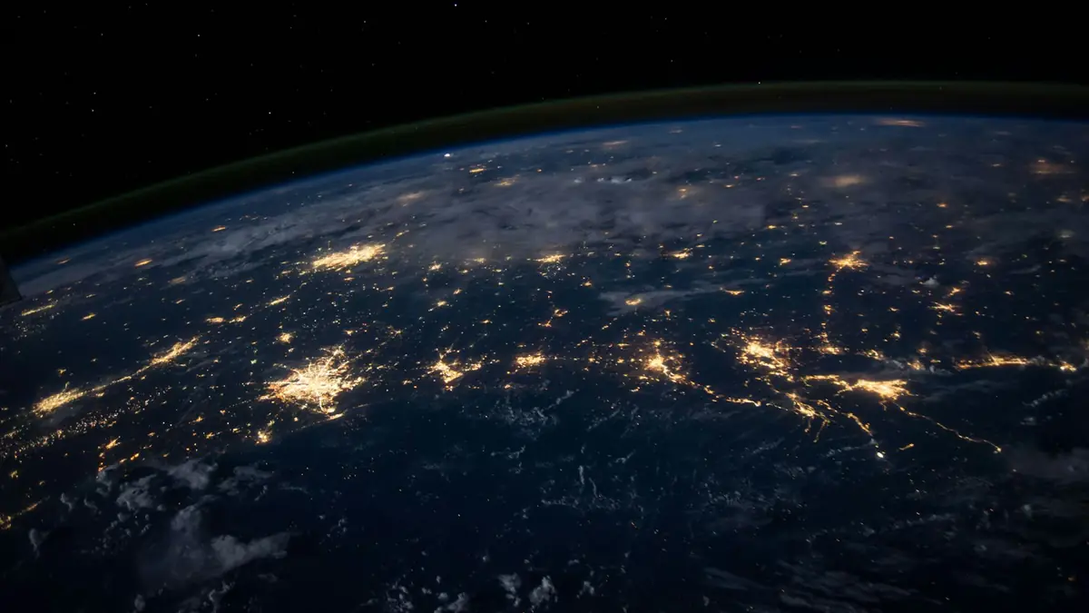 Night view of the Earth from space with connected city lights