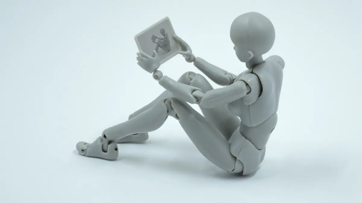 Figura articulada de madera sentada leyendo un libro